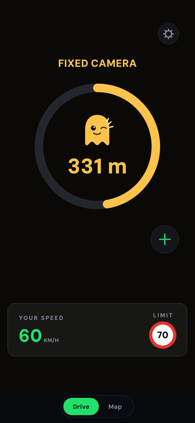The Ghost app warning before a camera in Dubai: FIXED CAMERA, an amber ring emptying around the ghost, 331 m, a speed of 60 km/h beside a limit sign reading 70.